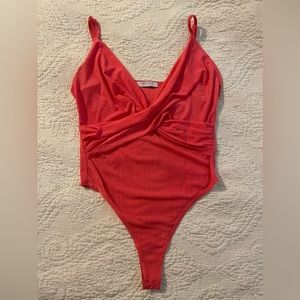 Coral pink women’s body suit size medium